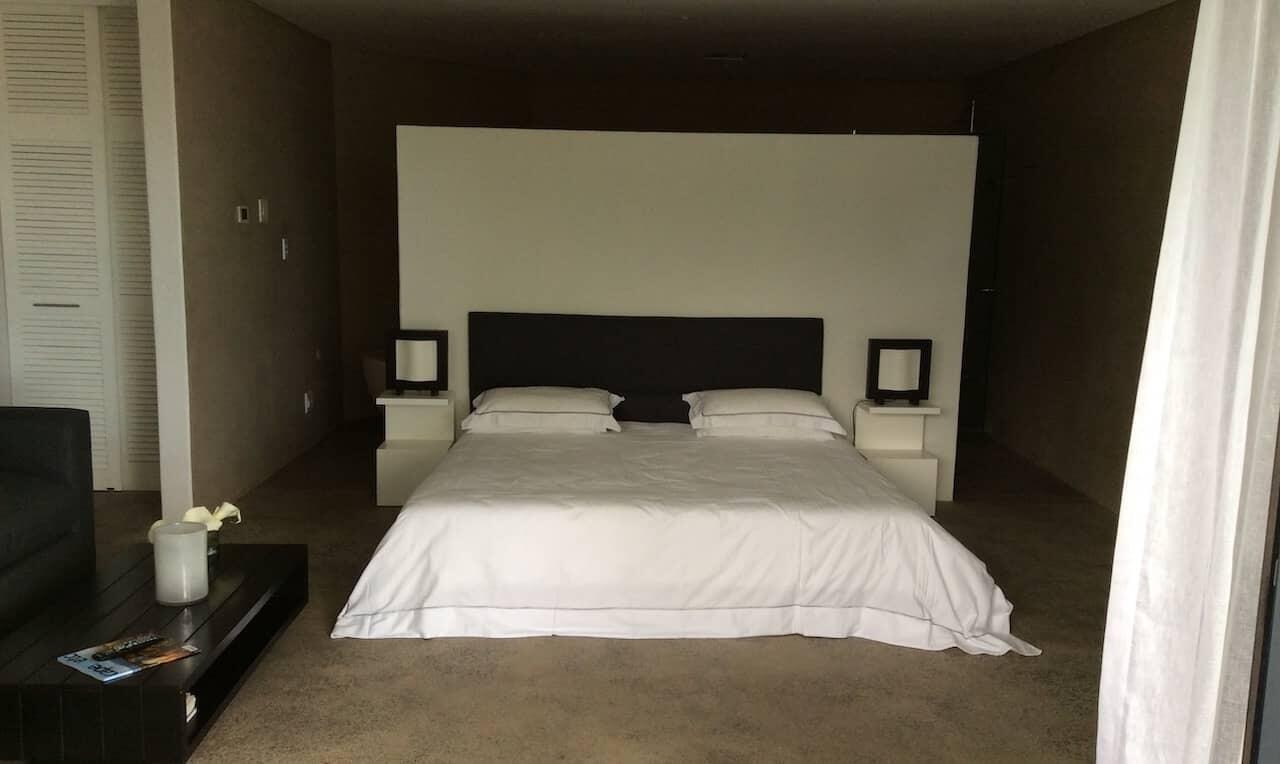 couples enjoy a massage on a king size bed